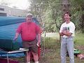 Marty Williams cooking breakfast with John Boldt lookin on